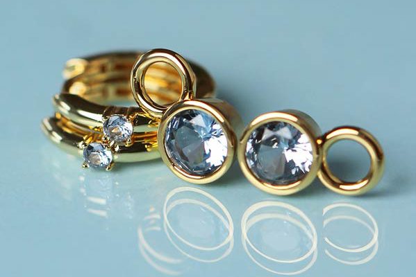 Gouden Zinzi ringen met lichtblauwe stenen