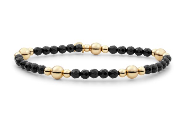 Zwarte armband met gouden kralen